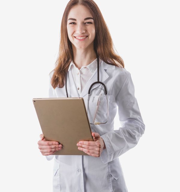A smiling doctor holding a clipboard
